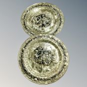 A pair of large brass embossed plaques,