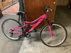 An Apollo spiral full suspension mountain bike