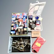 Three crates of car parts including head lights, wing mirrors, track rod ends, cooling caps, etc,