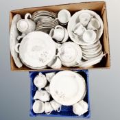 A box and basket containing Czech tea and dinner ware