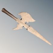 An old metal halberd spear head