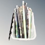 A storage crate of rolled posters