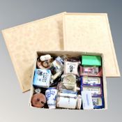 A box of die cast cars,