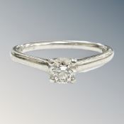 A platinum diamond solitaire ring, the stated diamond weight 0.