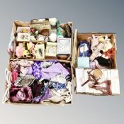 Three boxes of clothing, scarves, musical editions, plate stands, collectables, Ringtons vehicles,