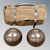 A canvas carry case containing a pair of Jacques Eclipse lawn bowls (36)