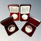 Four silver Canadian dollars