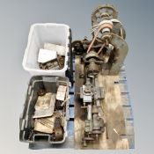 A vintage industrial lathe together with two crates of lathe accessories,