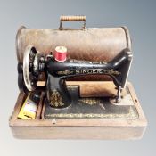 A Singer sewing machine in case