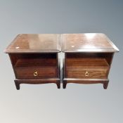 A pair of Stag bedside stands fitted a drawer