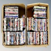Two boxes containing approximately 100 DVD's