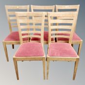 A set of five contemporary oak ladder backed chairs