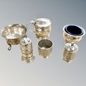 A group of silver includings salt, mustard pot with spoon,
