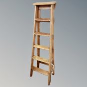 A set of folding vintage pine steps