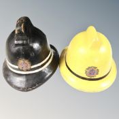 Two vintage Tyne and Wear metropolitan fire brigade helmets