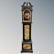 A contemporary cabinet in the form of a granddaughter clock