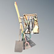 A bundle of garden tools together with a further box containing gardening hand tools