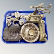 A tray of antique and later metal wares, ornate brass bracket, pair of brass fire dogs,