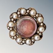 A vintage gold memoriam ring set with hair CONDITION REPORT: 4.