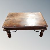 A sheesham wood coffee table