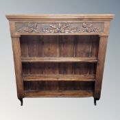 A stained pine delft rack