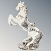 A contemporary decorative figure of a rearing horse, height 68 cm.