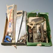 Two boxes of vintage hand saws and wood working planes