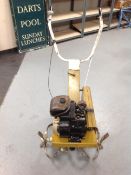 A Qualcast Cultivate petrol rotivator