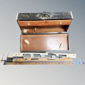 A joiner's tool box together with spirit levels,