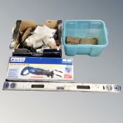 A Powercraft reciprocating saw, boxed, together with two boxes of spirit level, metal wedges,