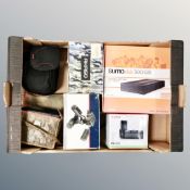 A box of professional camera supports, boxed camera, Sumo 500GB external hard drive,