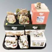 A tray of eight Lilliput Lane ornaments, four boxed.