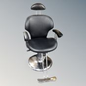 A hydraulic barber's chair