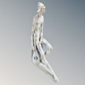 A Nao figure of a Harlequin with mandolin