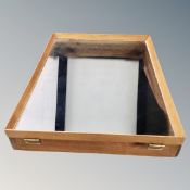 A table top curio display cabinet,