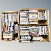 Three boxes of approximately 150 DVD's