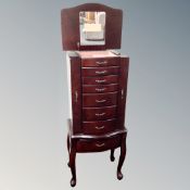 A Thomas Pacconi Classix eight drawer jewellery chest / cabinet on raised legs