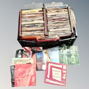 A crate of two cases of mid 20th century and later vinyl 7