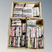 Three boxes of approximately 150 DVD's
