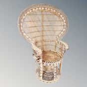 A vintage wicker peacock chair