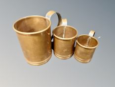 A graduated set of three vintage copper tankards