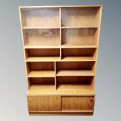 A 1970's Danish teak triple section bookcase