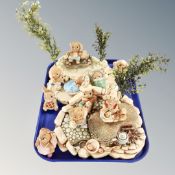 Two Pendelfin stands together with ten figures