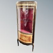 A French corner vitrine with gilt metal mounts
