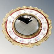 A Royal Staffordshire pottery and gilt framed porthole mirror