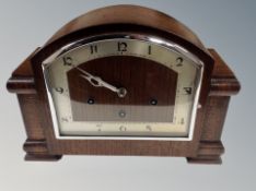 A 1930's oak cased mantel clock