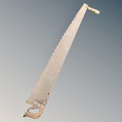 A vintage spear Jackson twin handled cross cut saw,