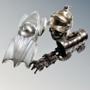 An Art deco polished aluminium car ashtray together with two novelty table lighters