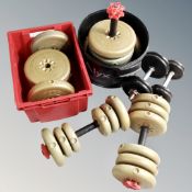A pair of dumbbells with cast iron weights together with three dumbbells with vinyl weights
