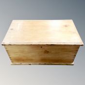An antique pine blanket box